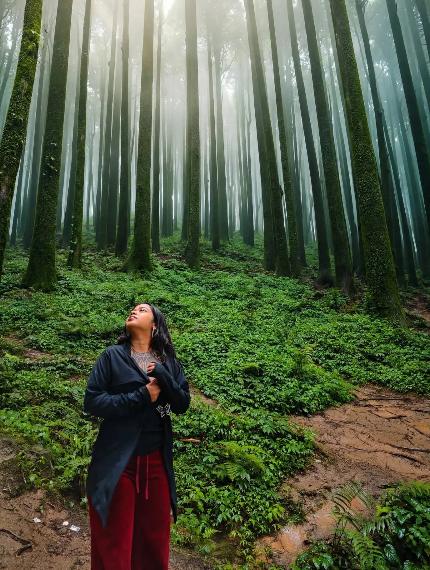 Prerna in a misty forest cathedral in Lamahatta